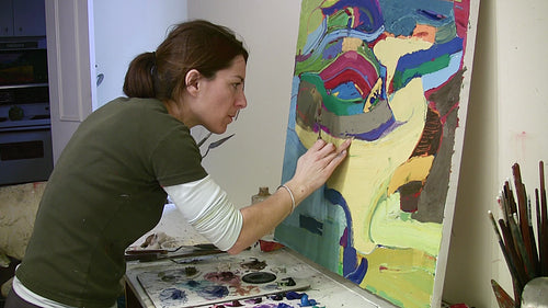 Artist working in the studio. HD video.