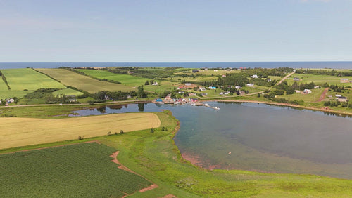 Drone aerial flight towards community of French River, PEI, Canada. 4K.