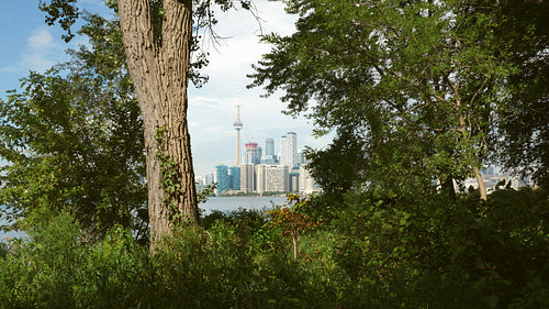 View of downtown Toronto and CN Tower from Toronto islands. 4K stock video.