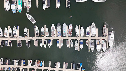 Static drone shot over boats in marina. Charlottetown, PEI, Canada. 4K.