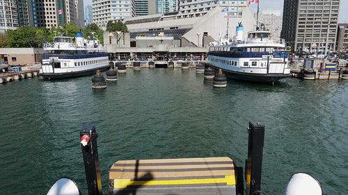 Passenger view from ferry arriving at Jack Layton terminal. Toronto, Canada. 4K stock video.