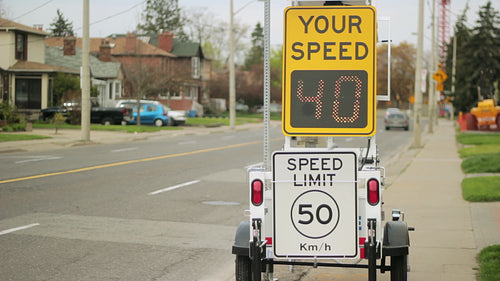 Portable radar message board to control driving speed. East York, Toronto. HD video.