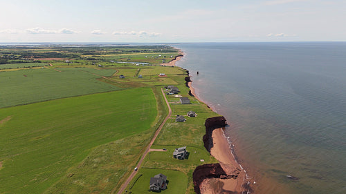 Drone aerial flight over beachfront properties. PEI, Canada. 4K.