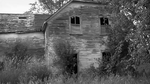 Haunted house. Windows detail. Abandoned farmhouse in rural Ontario. Black and white. HD.