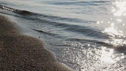 Slow motion sunlit wave. Gibraltar Beach, Toronto Islands. HD stock video.