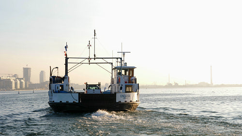 View of Ongiara car ferry leaving Hanlans point on the Toronto Islands. 4K stock video.