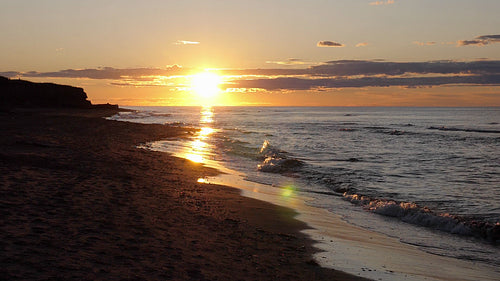 Slow motion waves. Prince Edward Island beach summer sunset. Canada. HD.