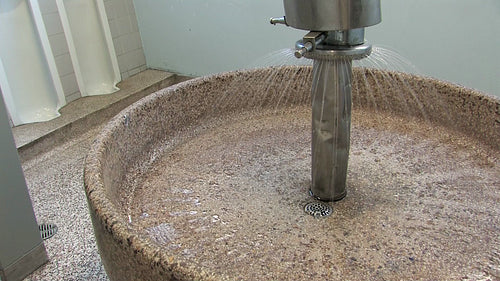 High school washroom. Water running at big old school sink. Ontario, Canada. HD video.