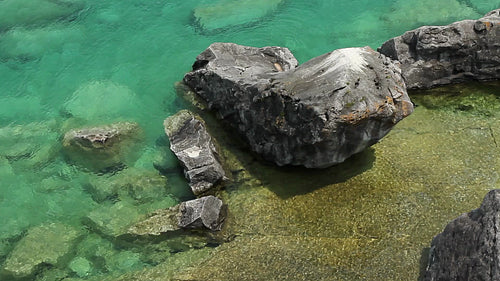 Overhead view from cliff of rocks and water of Georgian bay. HD.