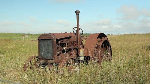 Old, rusty tractor in Saskatchewan, Canada. HD.