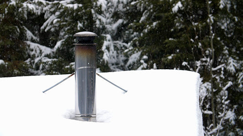 Winter chimney with slow motion snow falling. Rural Ontario, Canada. HD.