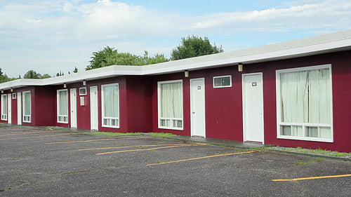 Classic motel. Exterior showing rooms. Angle shot. Quebec, Canada. HD.