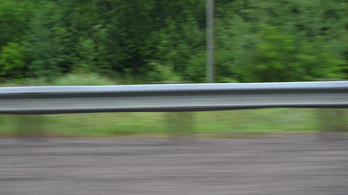 Highway barrier in rural area. Driving in the countryside. Ontario, Canada. 4K.