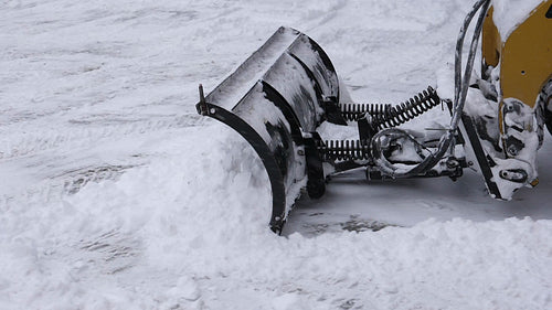 Slow motion snow plow at work. Clearing driveway. Winter in Canada. HD.