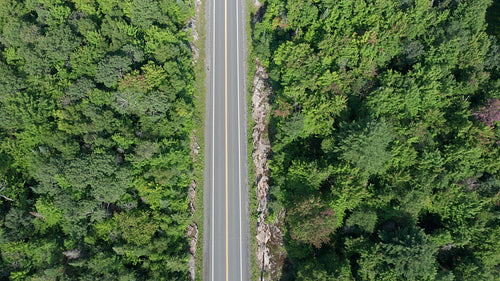 Drone aerial of summer highway. Top down view. Summer in rural Ontario, Canada. 4K.